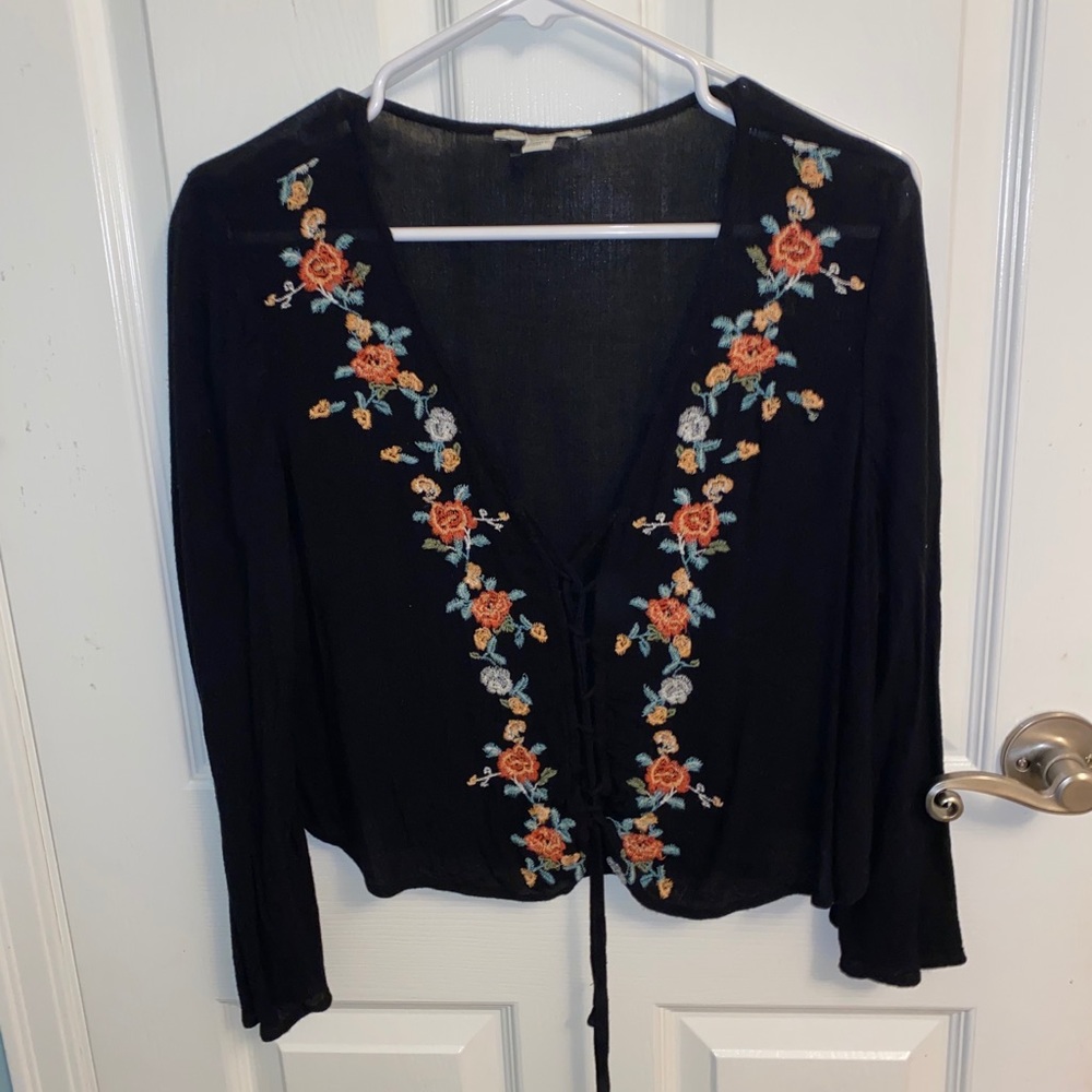 Black low cut tie blouse.